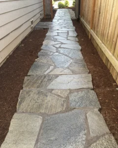 Landscape Irregular Shaped Flagstone Set in Concrete Pathway