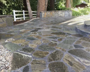 Irregular Shaped Flagstone Set in Concrete Patio